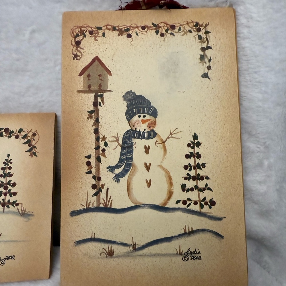 Three Pictures of winter snowman scenes by Lydia in 2002